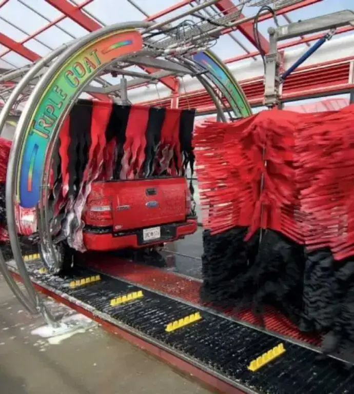 Truck going through Tommy Car Wash