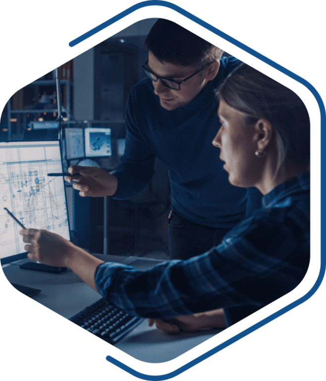 Office workers looking at CAD Solution drawing on screen